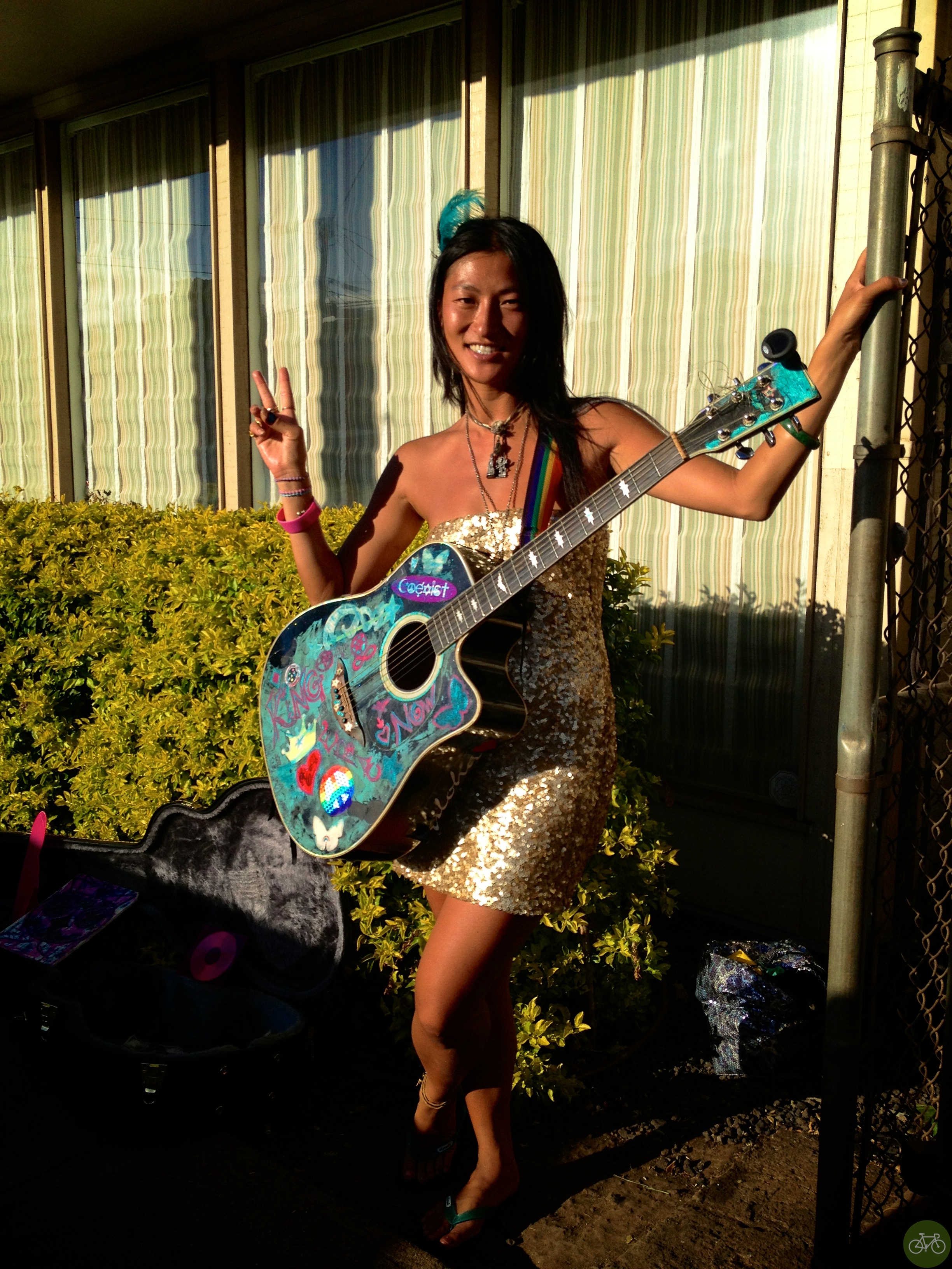 Angel Starlove busking on a corner in Paia